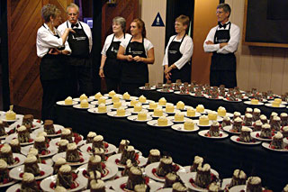 A busy wait-staff ready to share gourmet chocolate dessert catering from the Truffle Shop in Nevada City, CA