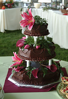 A Truffle Shop gourmet chocolate torte wedding cake created and catered by the Truffle Shop for a Hawaiian-themed wedding in Grass Valley, CA