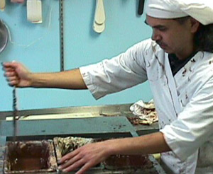 Rudy Udarbe working on creations of gourmet chocolate truffles in the 1990s.